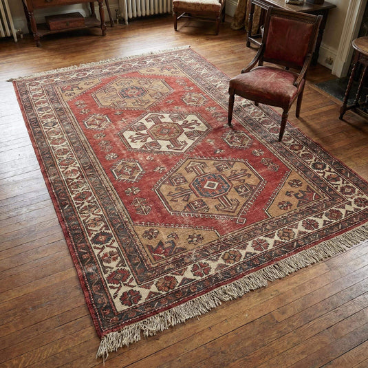 Translation missing: es.Hand knotted tribal wool area rug with geometric medallion design and natural wool pile