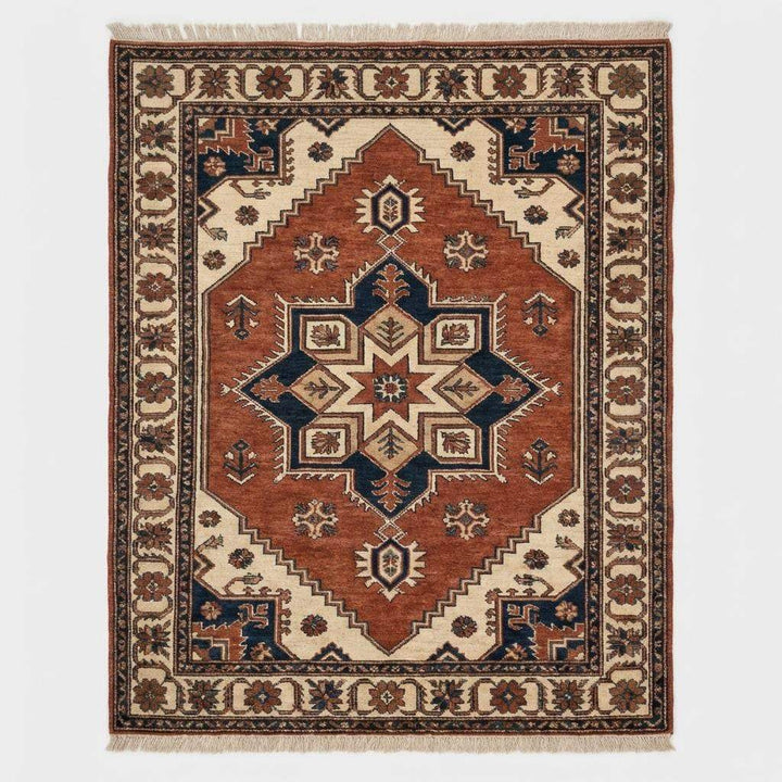 Translation missing: en.Traditional hand knotted geometric rug styled in rustic living room with warm wood flooring