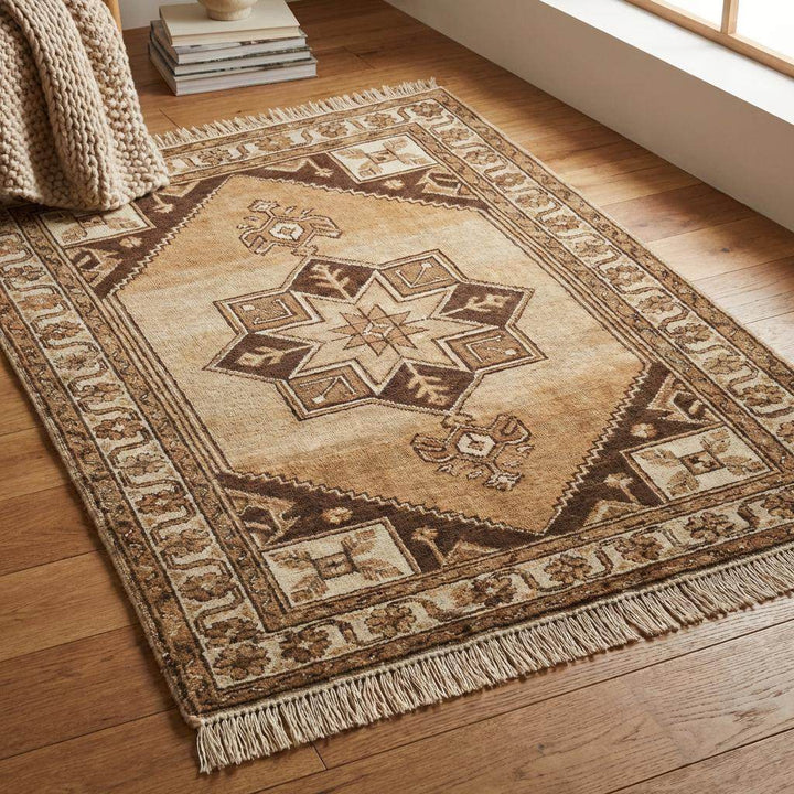 Translation missing: en.Authentic hand knotted wool carpet featuring ethnic tribal design and warm earth tones