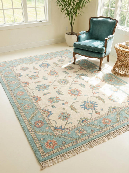 Translation missing: es.Hand knotted wool Oushak rug with blue floral Persian design and cream teal tones for elegant living room decor