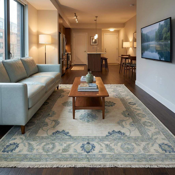 Translation missing: es.A muted color hand-knotted wool rug shown in a bright, contemporary living room setting