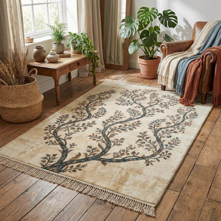 Translation missing: es.Botanical ivory rug featuring a symmetrical branching tree design with earthy terracotta and gold floral accents on deep teal branches