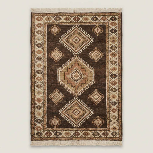 Translation missing: es.Traditional hand knotted wool rug with geometric diamond motifs and earthy tones