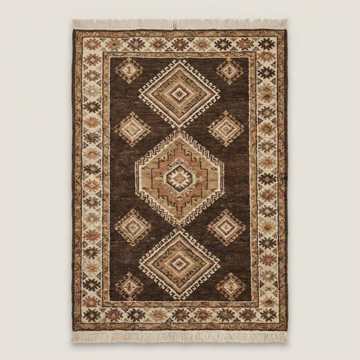Translation missing: en.Traditional hand knotted wool rug with geometric diamond motifs and earthy tones