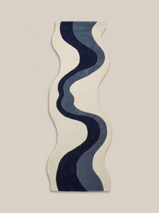 Translation missing: es.Modern abstract hallway runner rug placed in minimalist corridor featuring organic wave pattern in navy blue and grey tones