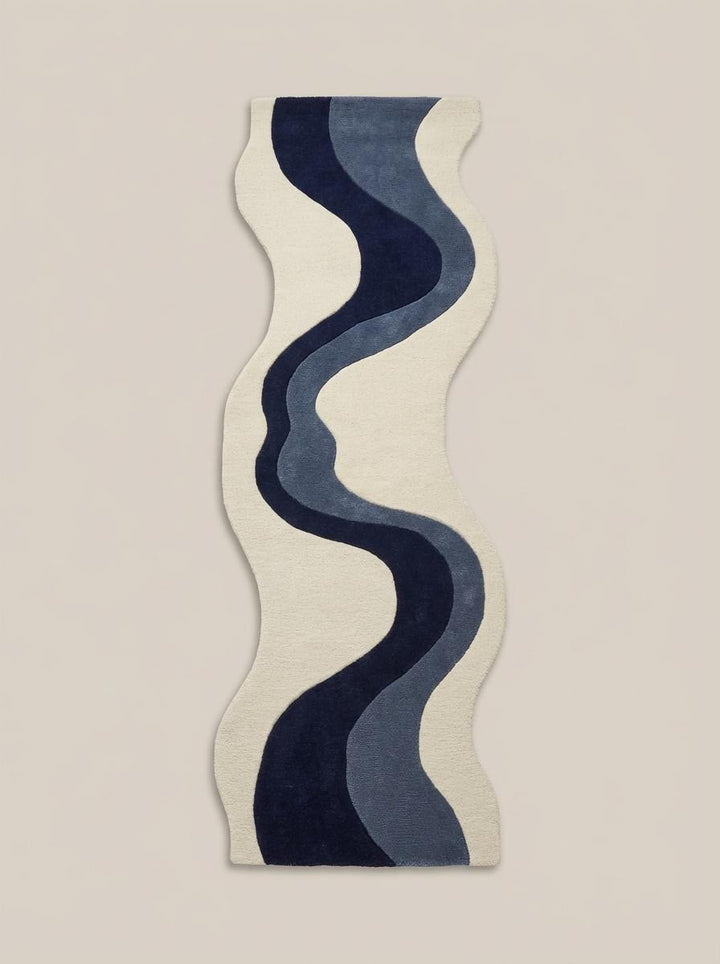 Translation missing: es.Modern abstract hallway runner rug placed in minimalist corridor featuring organic wave pattern in navy blue and grey tones