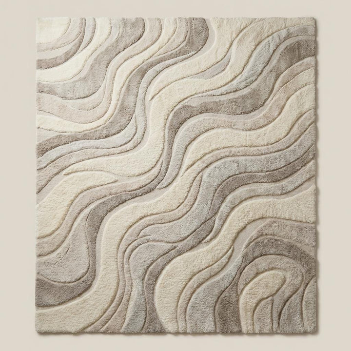 Translation missing: es.Contemporary neutral area rug with flowing organic pattern styled beside mid-century wooden furniture