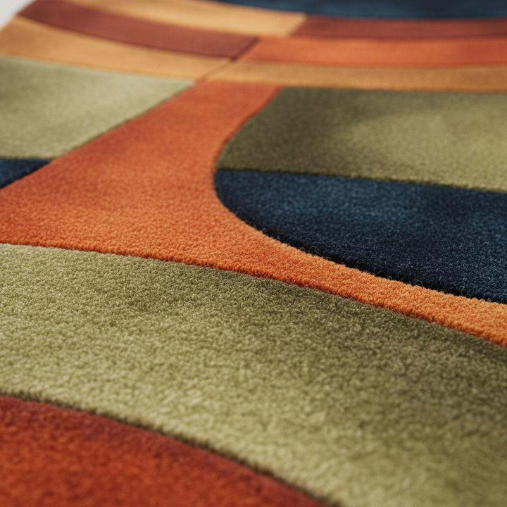 Translation missing: es.Handmade retro rug with curved geometric pattern in burnt orange, olive green, navy, and amber gold wool tufted carpet
