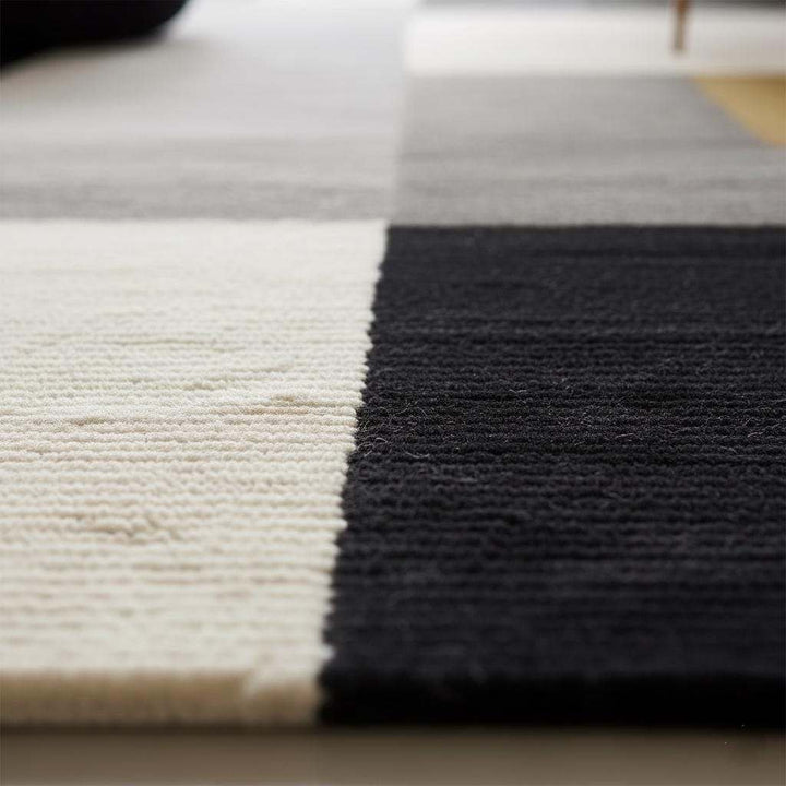 Translation missing: en.Handmade Geometric Wool Area Rug: Modern Black, Gray &amp; Cream Carpet