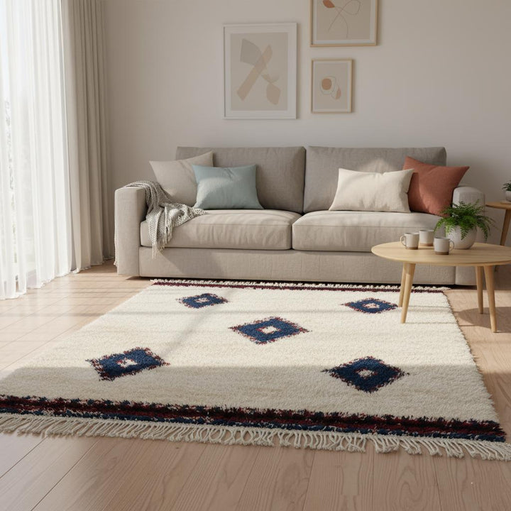 Translation missing: es.Authentic Berber wool kilim rug with a soft shag texture, showcasing traditional Moroccan design in natural undyed wool and indigo