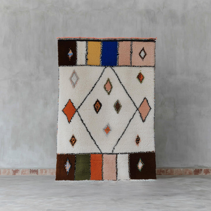 Translation missing: es.Handmade Moroccan Berber wool rug with cream diamond pattern and colorful geometric accents