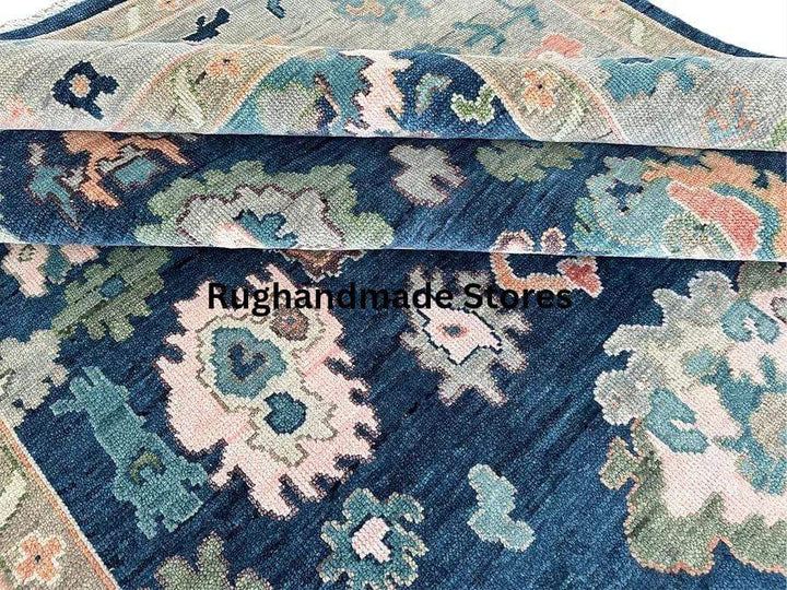 Translation missing: en.Handmade Oushak wool rug in blue and gray with traditional Turkish knot and intricate floral design