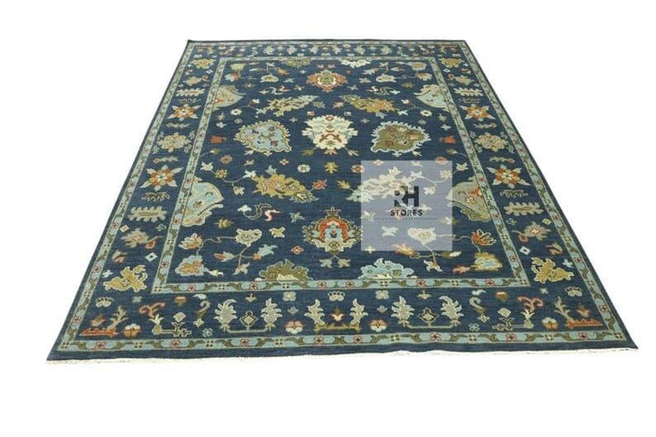 Translation missing: es.Handmade Oushak wool rug in olive green, beige, and gray with intricate floral Turkish knot design
