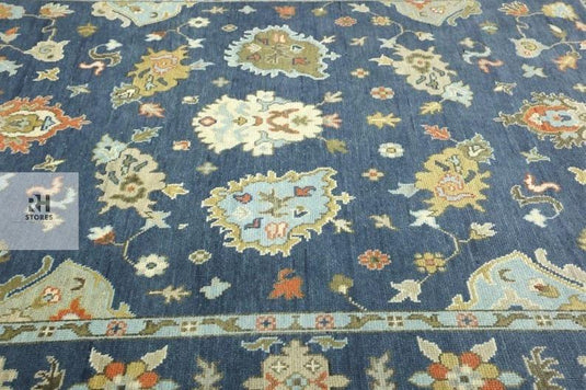 Translation missing: es.Handmade Oushak wool rug in olive green, beige, and gray with traditional floral Turkish knot design, perfect for living room décor
