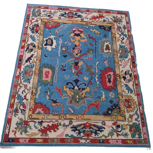 Translation missing: es.Handmade Oushak wool rug with dark blue Turkish knot floral design, 8x10 area rug for living room and home decor