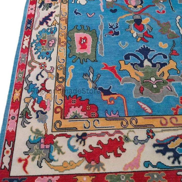 Translation missing: es.Handmade Oushak wool rug with dark blue floral Turkish knot design, 8x10 area rug