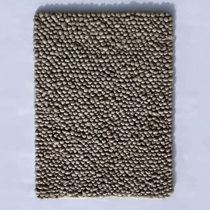 Translation missing: en.Top view of a handmade rectangular taupe felt ball rug with dense small pom-pom texture — chunky wool mat for living room, nursery or entryway