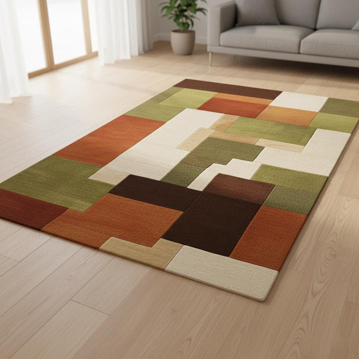 Translation missing: en.Mid-century modern rug with 70s-inspired color palette—olive green, rust orange, cream—soft wool texture and clean lines
