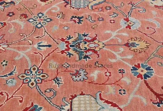 Translation missing: es.Handmade wool Turkish knot rug with pink and yellow Oushak floral design in 8x10 area size