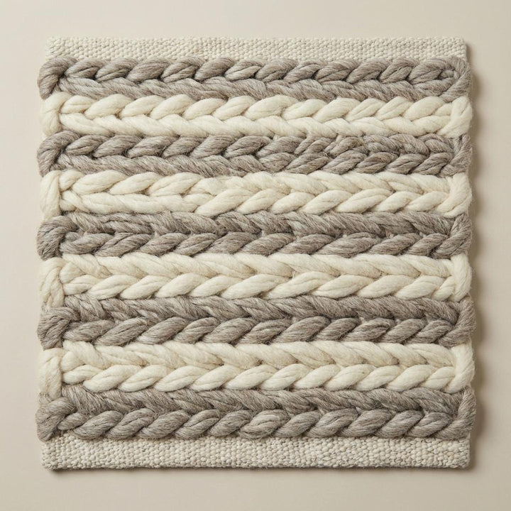Translation missing: es.Textured neutral wool rug with oversized braided pattern, perfect for modern minimalist and rustic interior décor