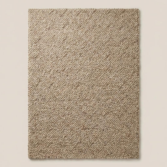 Translation missing: es.Handwoven chunky wool area rug in soft beige tone, natural wool carpet for farmhouse and modern interiors