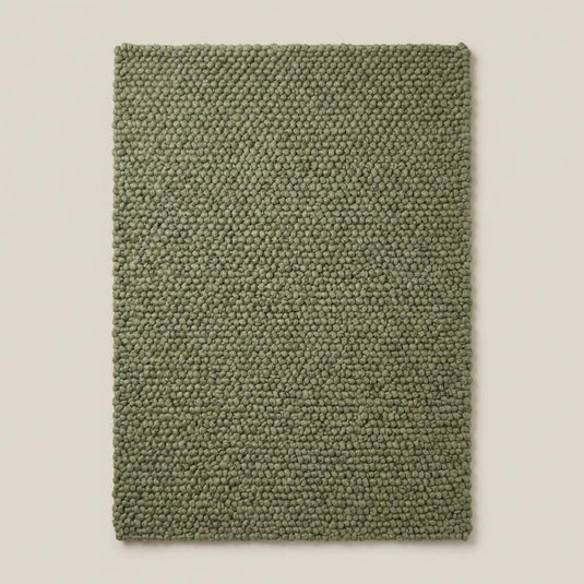 Translation missing: es.Chunky wool rug with thick handwoven texture in sage green, natural wool area rug for cozy minimalist home decor