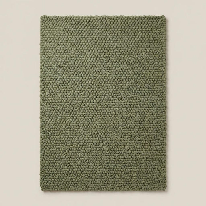 Translation missing: es.Chunky wool rug with thick handwoven texture in sage green, natural wool area rug for cozy minimalist home decor