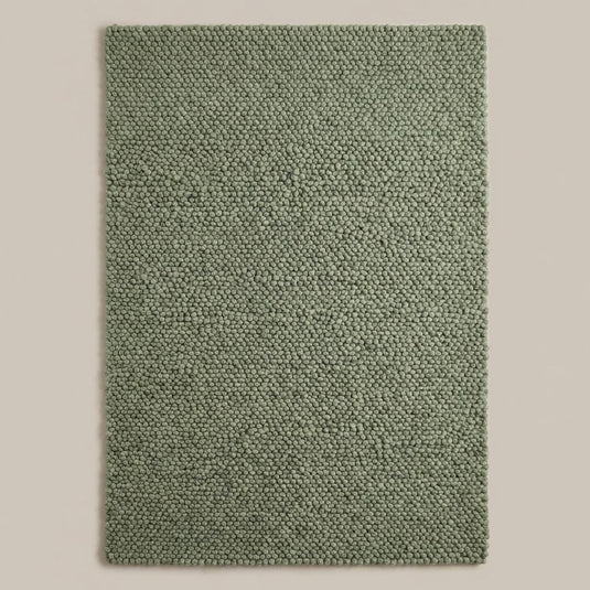 Translation missing: es.Handwoven chunky knit wool rug in neutral green tone, modern Scandinavian floor rug for warm and cozy interiors