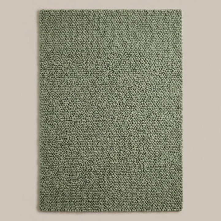 Translation missing: es.Handwoven chunky knit wool rug in neutral green tone, modern Scandinavian floor rug for warm and cozy interiors