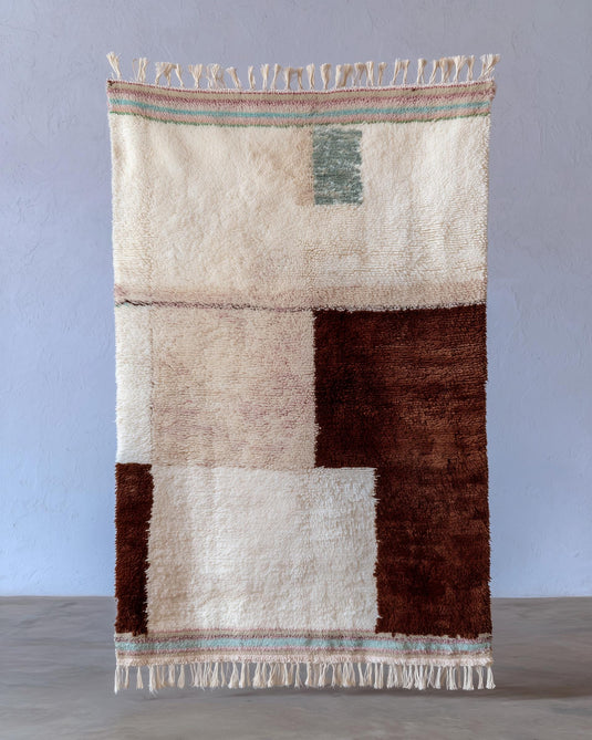 Translation missing: es.Handwoven Moroccan Berber wool rug with cream base, chocolate blocks, peach highlights, mint stripes, and high-pile shag texture