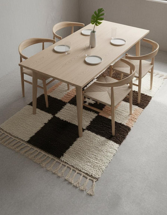 Translation missing: es.Textured handwoven wool rug with bold checkerboard design and small central symbol, cream, chocolate, peach tones — boho area rug, rug teppich