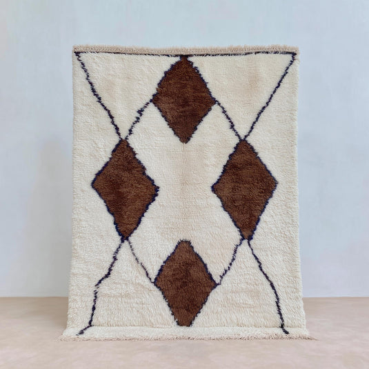 Translation missing: es.Handwoven Wool Beni Ourain Rug with ivory background and brown diamond motifs, plush Moroccan wool area rug