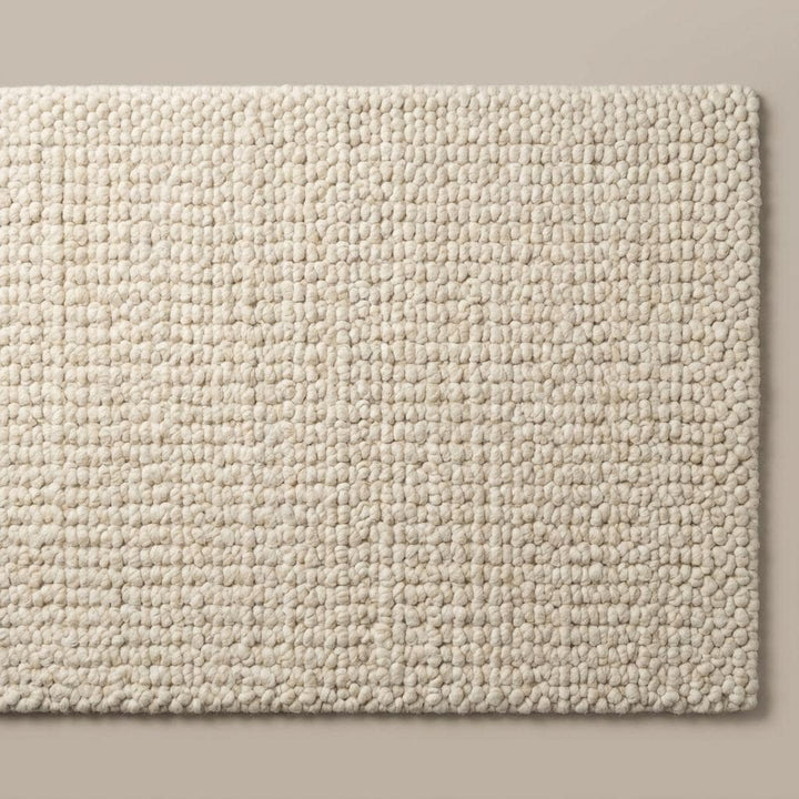 Translation missing: es.Neutral ivory wool area rug with textured surface for modern organic home interiors
