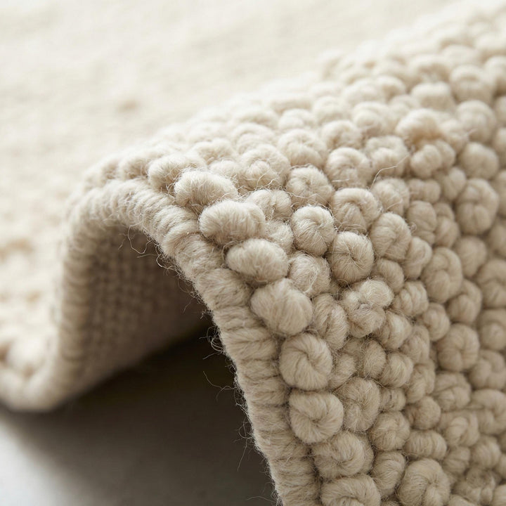 Translation missing: es.Ivory chunky wool area rug with thick looped texture for cozy modern minimalist interiors
