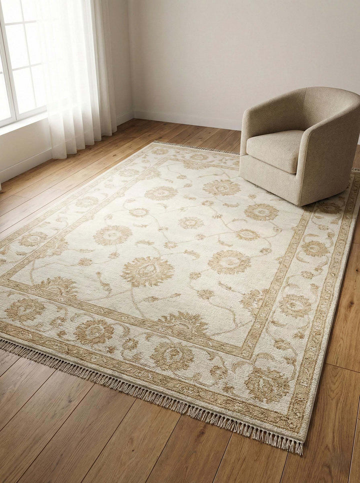Translation missing: en.Ivory Oushak area rug with hand-knotted wool and soft floral design for elegant living rooms