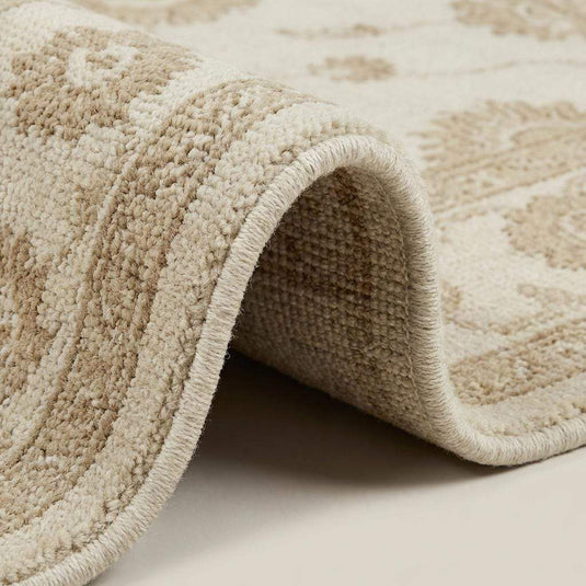 Translation missing: en.Close up of hand knotted wool pile showing individual knots and natural fiber texture