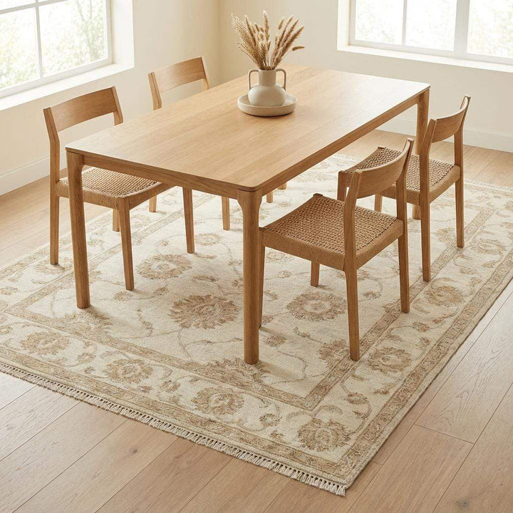Translation missing: en.Elegant ivory wool hand knotted area rug with subtle floral detailing