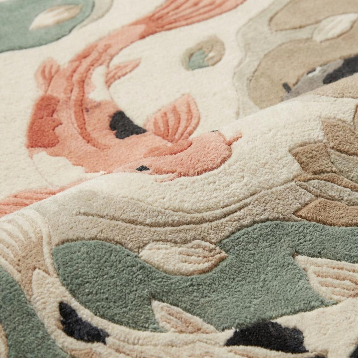 Translation missing: en.Close-up of koi fish rug showing plush fibers, carved detailing, raised lotus patterns, and soft textured pile highlighting quality craftsmanship and comfort