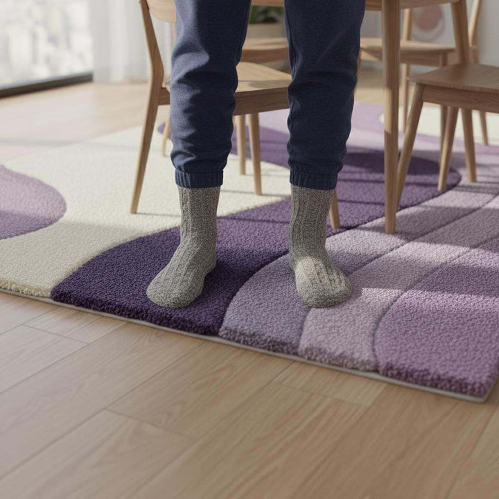 Translation missing: es.Lavender area rug with modern retro curvy stripe pattern and plush tufted surface in soft pastel purple and cream colors