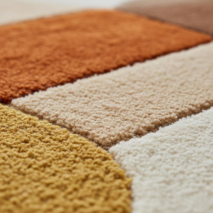 Translation missing: en.Mid century area rug with plush thick pile and geometric retro pattern in warm burnt orange, mustard yellow, and cream tones