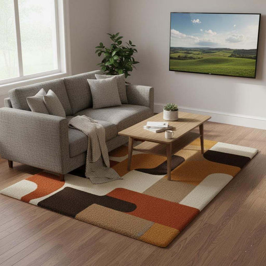 Translation missing: en.Mid century modern rug with geometric retro design in warm orange, yellow, brown, and cream tones, soft tufted texture, and durable construction