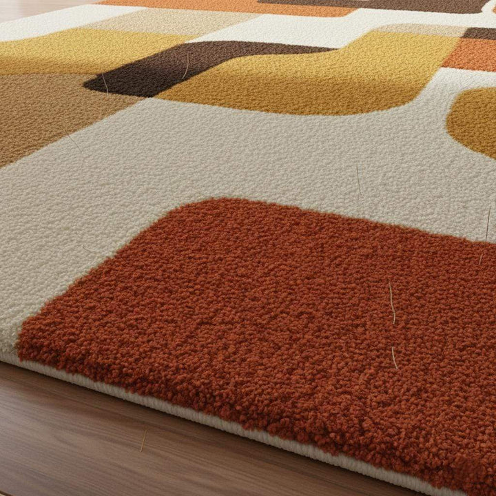 Translation missing: en.Mid century modern rug with retro geometric pattern in warm orange, yellow, and brown tones, soft tufted texture, and durable handmade design