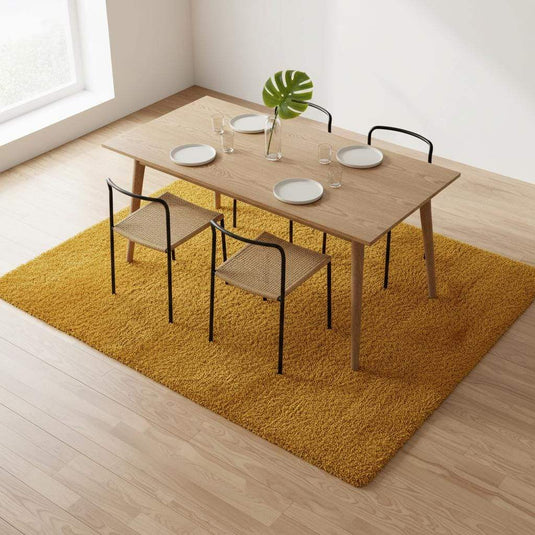 Translation missing: es.Mustard yellow area rug with retro mid-century design and low pile texture for living room decor