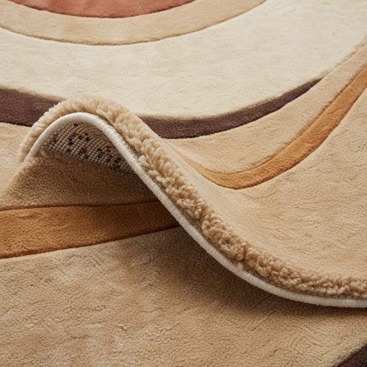 Translation missing: en.Close-up of hand tufted rug texture showing plush pile height, dense fibers, soft wool surface, and clean carved edges highlighting craftsmanship and comfort