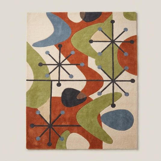 Translation missing: es.Modern abstract wool area rug in rust orange, sage green, ivory, and blue styled beside a mid century accent chair __etsy:8048433139