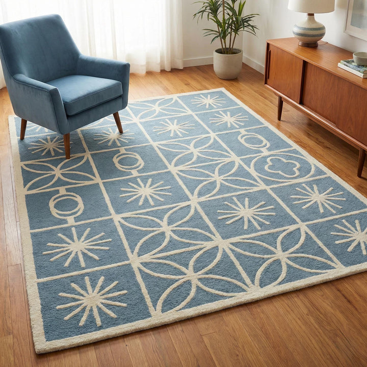 Translation missing: en.Mid Century Modern blue area rug with Scandinavian cream geometric starburst pattern and soft plush pile