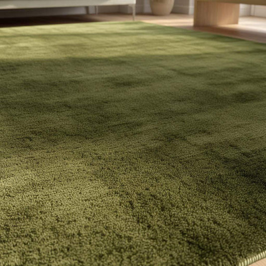 Translation missing: es.Close-up of plush olive green rug texture