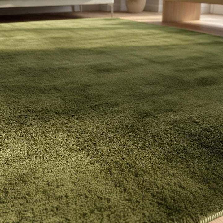 Translation missing: en.Close-up of plush olive green rug texture
