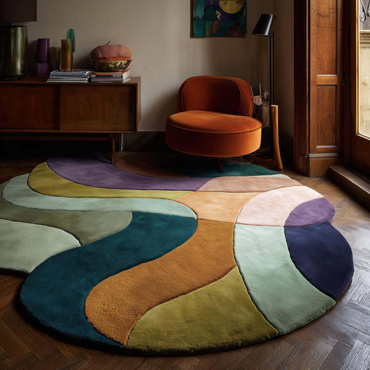 Translation missing: es.Abstract wool rug with hand-tufted freeform design and vibrant color blocks in teal, mustard, and blush