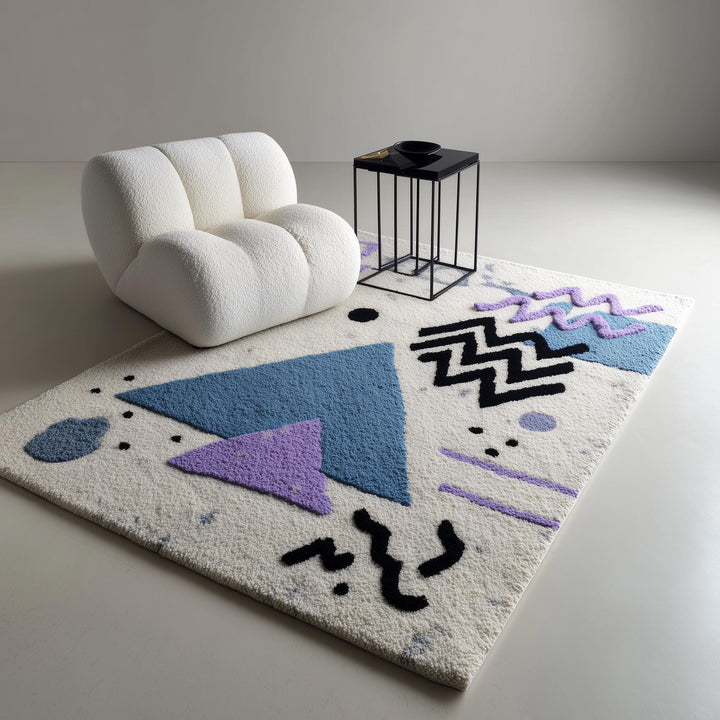 Translation missing: es.Abstract geometric rug with pastel blue and lavender shapes on ivory base, soft bouclé texture, modern Memphis style area rug